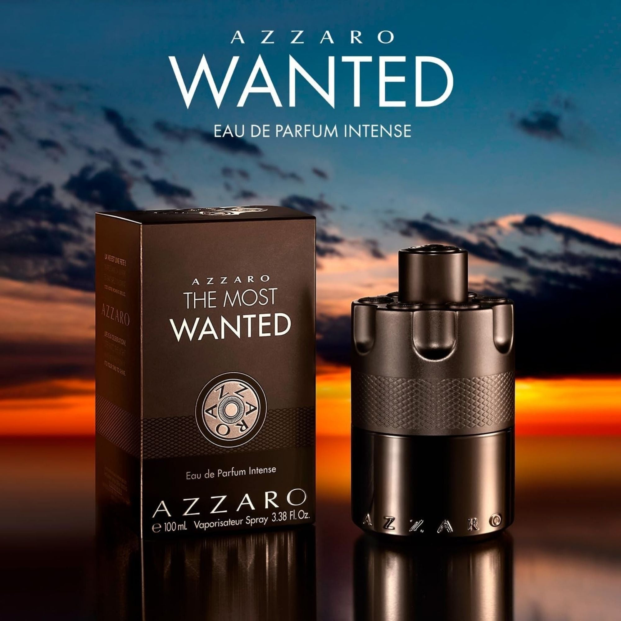 Azzaro Wanted perfume bottle and packaging with a mountainous background