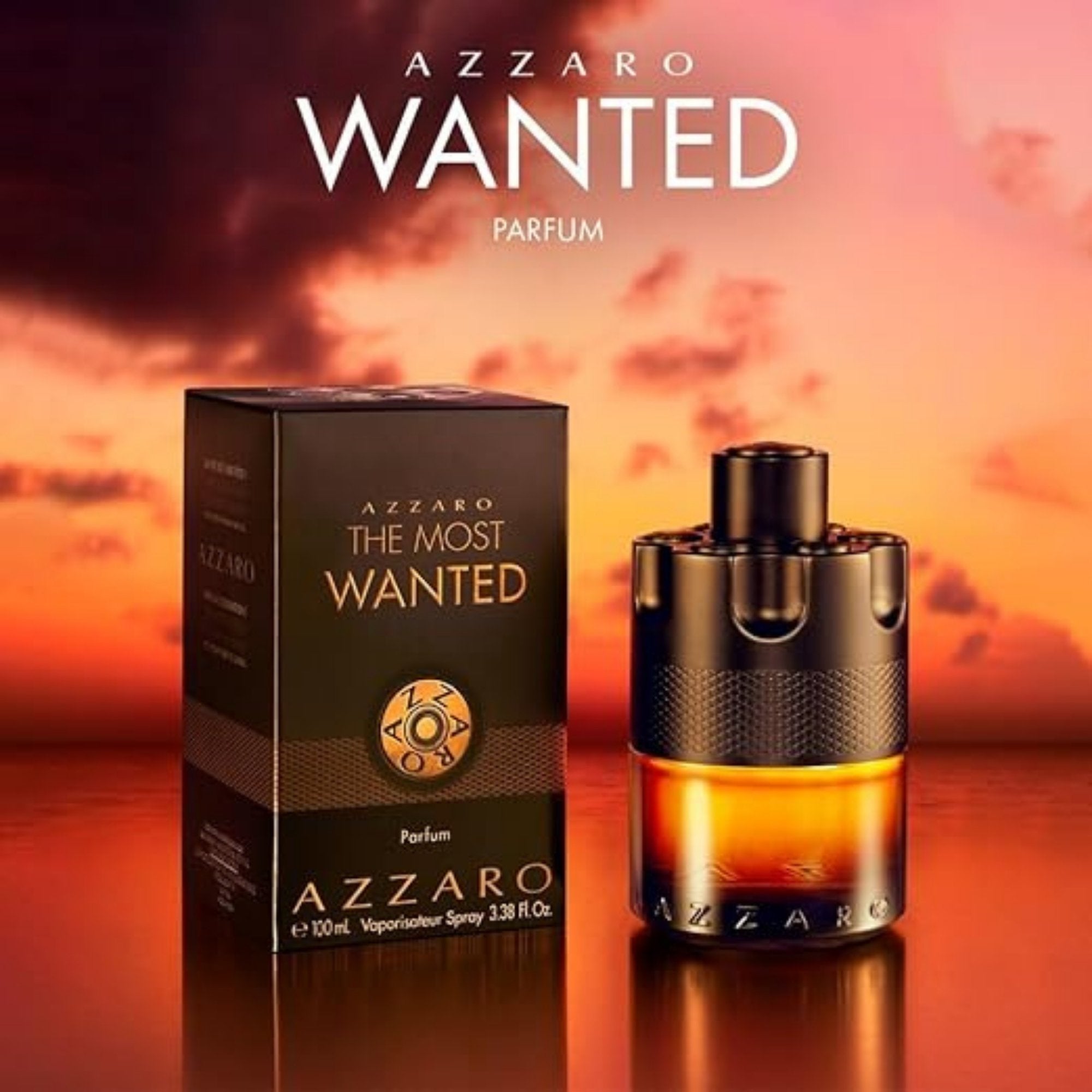 Azzaro Wanted perfume bottle and packaging with a sunset background