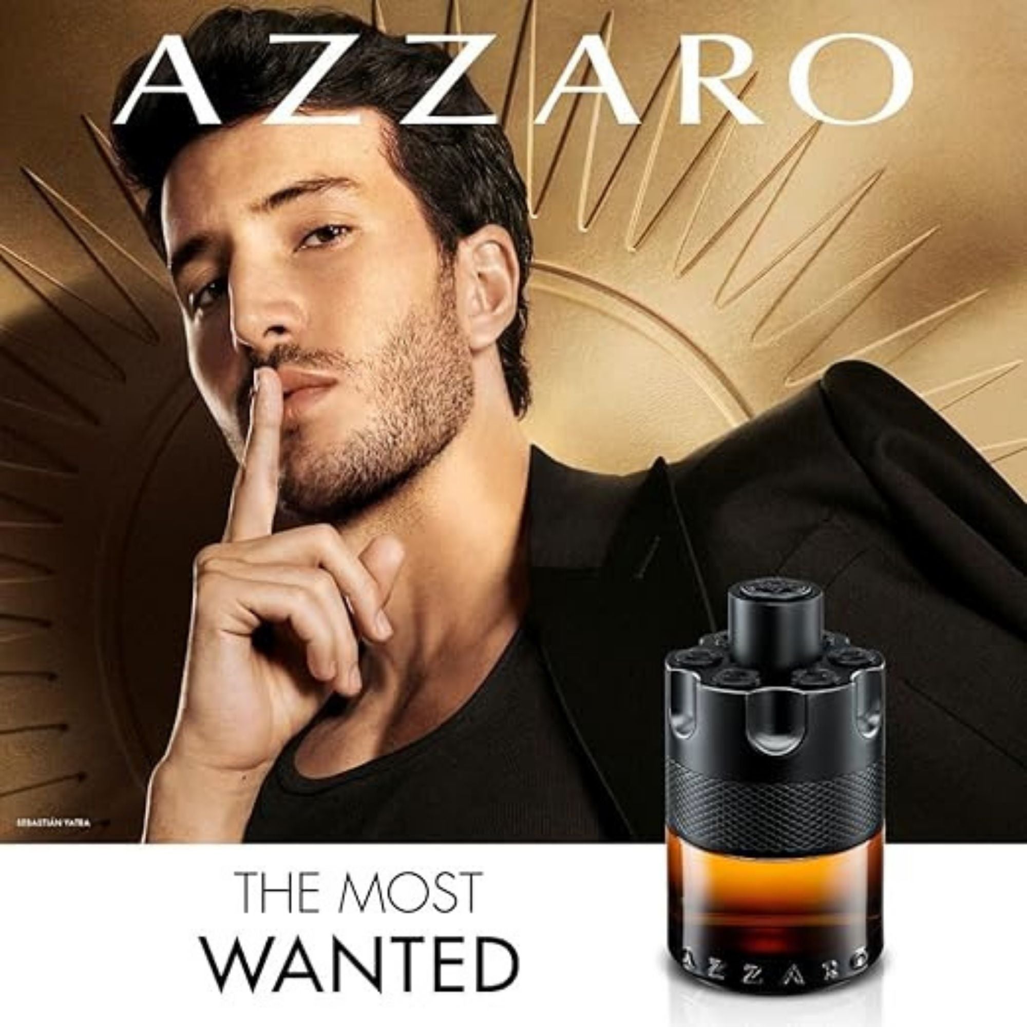 Azzaro perfume advertisement with a man and the perfume bottle.